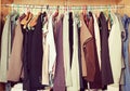 Pile of messy clothes in closet. Untidy cluttered woman wardrobe Royalty Free Stock Photo