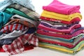 Pile of messy and ironed clothes Royalty Free Stock Photo