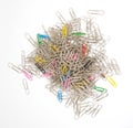 Pile of metal paperclips isolated Royalty Free Stock Photo