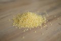 Pile of millet on a wooden table