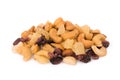 Pile of mixed nuts and dried fruits isolated on white Royalty Free Stock Photo