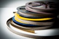 Pile of 8mm super8 movie reels with color effect and out of focus background Royalty Free Stock Photo