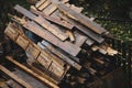 Pile of moist timber wood on a backyard during a rainy autumn day Royalty Free Stock Photo