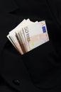 Pile of money fifty euros banknotes in pocket Royalty Free Stock Photo