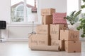 Pile of moving boxes and household stuff Royalty Free Stock Photo