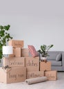 Pile of moving boxes and household stuff Royalty Free Stock Photo