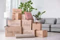 Pile of moving boxes and household stuff Royalty Free Stock Photo