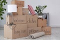 Pile of moving boxes and household stuff Royalty Free Stock Photo