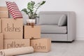 Pile of moving boxes and household stuff Royalty Free Stock Photo