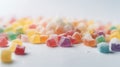 a pile of multi colored candies sitting on top of a table Royalty Free Stock Photo