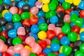 Pile of multicolored candies as background