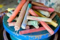 pile of multicolored chalk sticks on a potters wheel