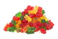 Pile of multicolored jelly bears candy on white background