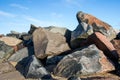 Pile of multicolored rocks and boulders as coastal erosion beac Royalty Free Stock Photo