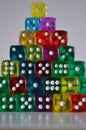 Pile of multiple coloured plastic arcylic d6 six sided die dice variable focus