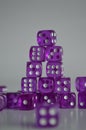 Pile of multiple purple plastic arcylic d6 six sided die dice variable focus