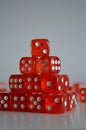 Pile of multiple red plastic arcylic d6 six sided die dice variable focus