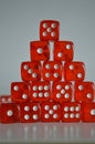 Pile of multiple red plastic arcylic d6 six sided die dice variable focus