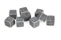 Pile of multiple whiskey cooling stone cubes on a white background