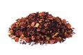 Pile of natural fruit tea with hibiscus petals, fruit slices and berries. Heap of aromatic fruit tea