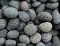 Pile of natural grey stones used to decorate the garden or parts of the house indoor or outdoor