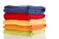 Pile of neatly folded colorful cotton towels