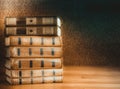 Pile of old books on a beautiful table Royalty Free Stock Photo