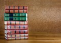 Pile of old books on beautiful wooden table Royalty Free Stock Photo