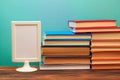 Pile of old books, frame  copy space  on blue background - Image.. Royalty Free Stock Photo