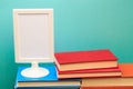 Pile of old books, frame  copy space  on blue background - Image. Royalty Free Stock Photo