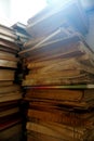 A pile of old books from the side Royalty Free Stock Photo