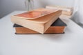 A pile of old books on a table Royalty Free Stock Photo