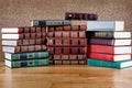 Pile of old books on wooden table Royalty Free Stock Photo