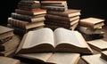 Pile of old books on a wooden table. Black background. Royalty Free Stock Photo