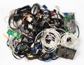 Pile of old cables and computer components on a white background. Royalty Free Stock Photo