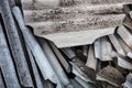 Pile of the old and damaged wavy roofing slates