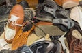 Pile of old different worn footwear Royalty Free Stock Photo