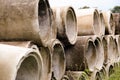 Pile of old and dirty cement pipes