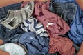 Pile of old dirty clothes and shoes for disposal, top view. Recycled processing, recyclable materials concept Royalty Free Stock Photo