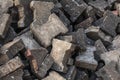 Pile of old discarded pavement segmental paver cobble stones Royalty Free Stock Photo
