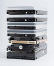 Pile of old hard drives on white background. Royalty Free Stock Photo