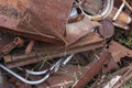 A pile of old metal farm parts now rusting away and ready to be used as scrap metal