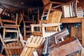 Pile of old obsolete wooden chairs Royalty Free Stock Photo