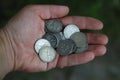 A pile of old Russian silver coins in hand Royalty Free Stock Photo