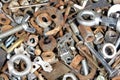 Pile of old rusty bolts and nuts background, texture. Forgotten stuffs Royalty Free Stock Photo