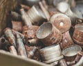 Pile of old rusty shell casings from assault rifles and mounted grenade launchers in metal box Royalty Free Stock Photo