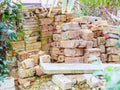 A pile of old used bricks stacked on the street Royalty Free Stock Photo