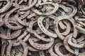 Pile of old used and rusty horseshoes Royalty Free Stock Photo