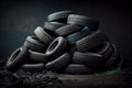 Pile of old used tires on grunge background with copy space. Generative AI