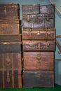 Pile of old vintage big wooden boxes stacked in a furniture store Royalty Free Stock Photo